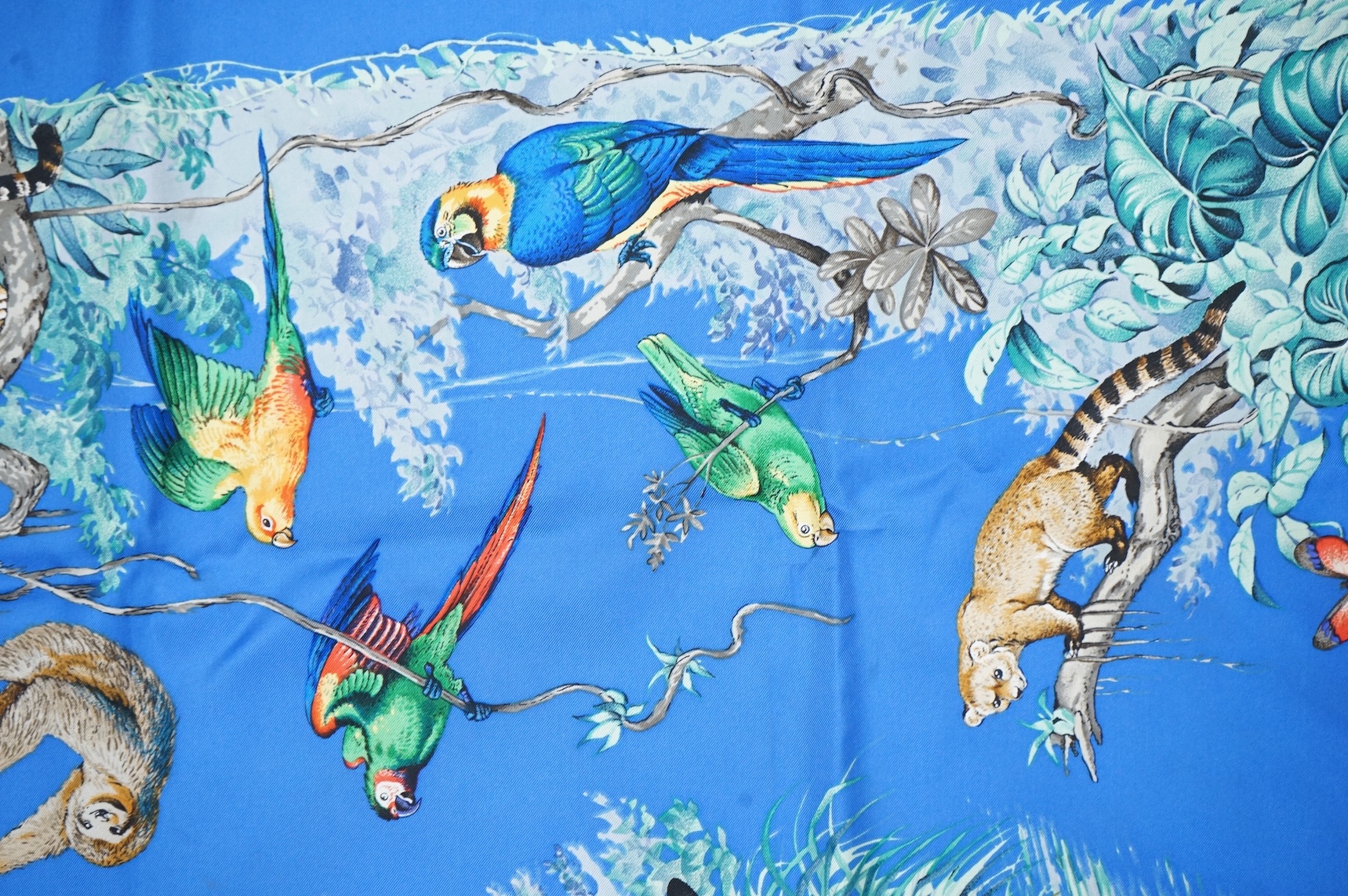 Two boxed Hermes silk scarves comprising ‘Real Escuela Andaluza del Arte Equestre’ and ‘Equateur’, with original boxes, together with four Hermes gentleman’s silk ties